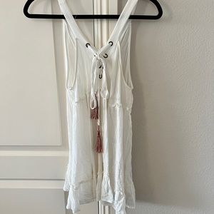 White light weight summer dress semi sheer. Front details.
